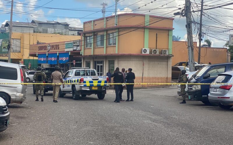 Two people died and several others were injured, in a shooting at the Mandeville market