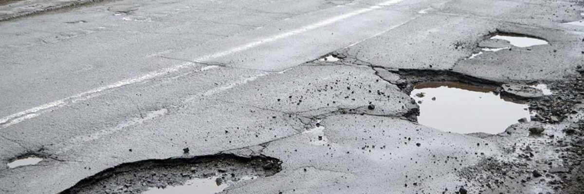 Residents of several Manchester North Eastern communities stage protest over poor road conditions and lack of water