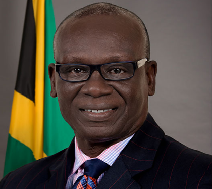 Local Government Minister Desmond McKenzie commends fire brigade for swift response to massive fire at Superior Auto Parts in Kingston