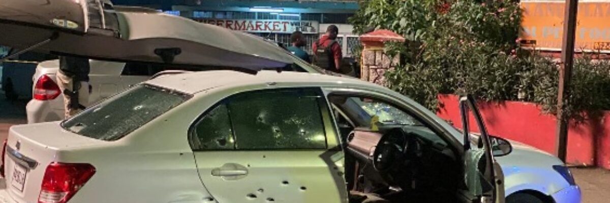 Chaotic scenes in Mandeville yesterday as armed men and police engage in gun battle