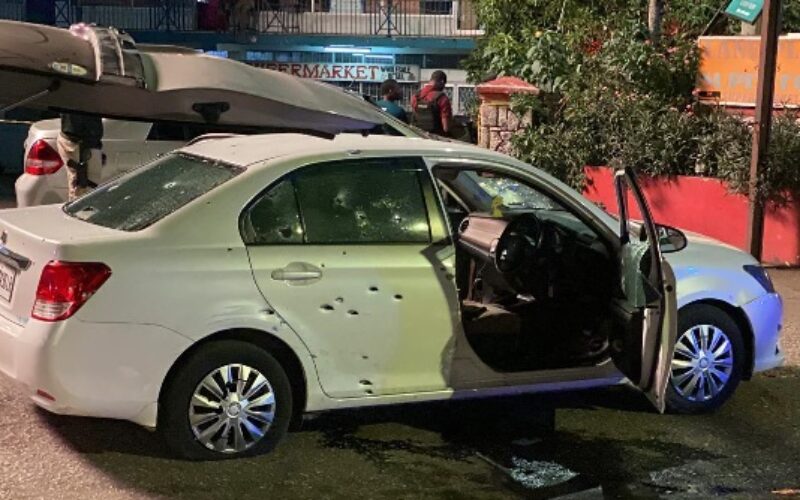 Chaotic scenes in Mandeville yesterday as armed men and police engage in gun battle