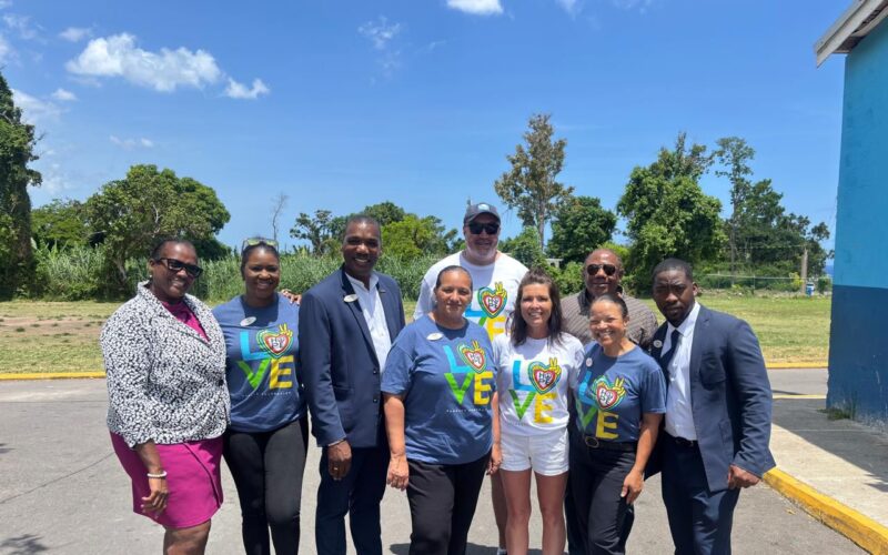 Sandals Ochi Beach team participates in Read Across Jamaica Day and hands over books to Exchange Primary