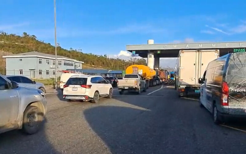 Traffic build up at Mammee Bay toll plaza after Toll Authority resumed collection of fees