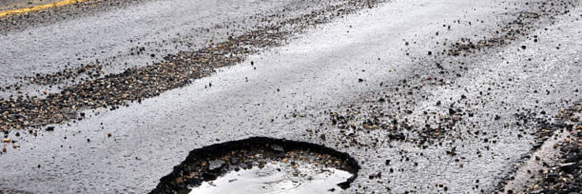 Commuters left stranded in Bellefield, Manchester as residents protest over poor road conditions