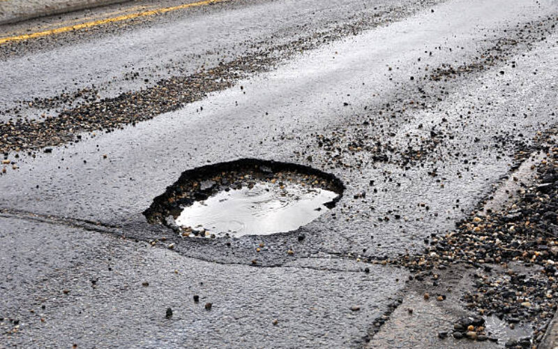 Commuters left stranded in Bellefield, Manchester as residents protest over poor road conditions