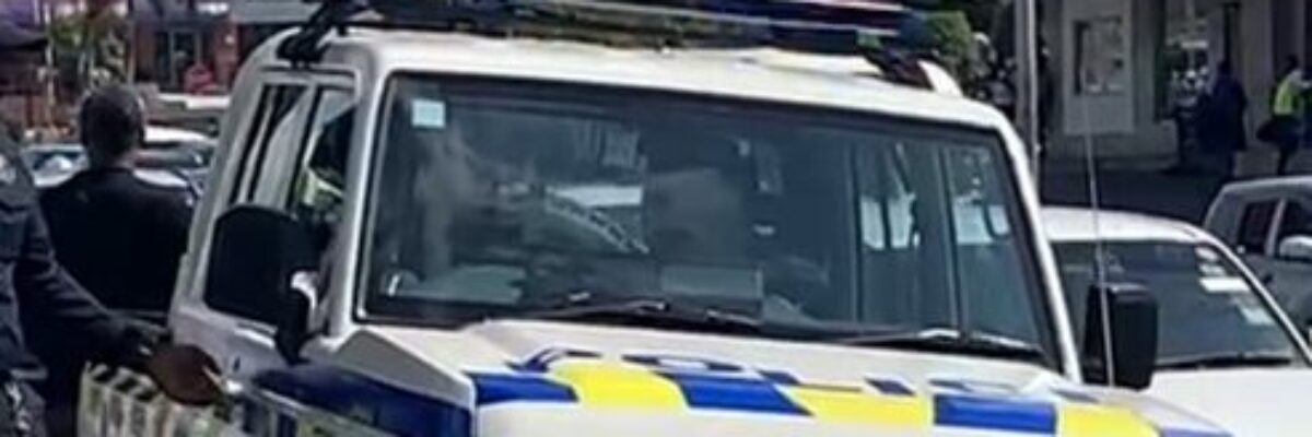 Specialized police teams and fire personnel responding to several bomb threats in 16 locations across several parishes