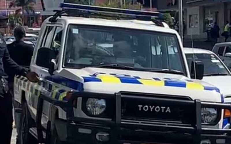 Specialized police teams and fire personnel responding to several bomb threats in 16 locations across several parishes