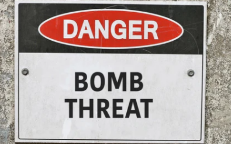 Bomb threats temporarily disrupted operations at Spanish Town Hospital and Police Station late last night