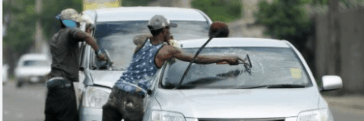 Government to develop plan to address windscreen wiping and other solicitation at major intersections