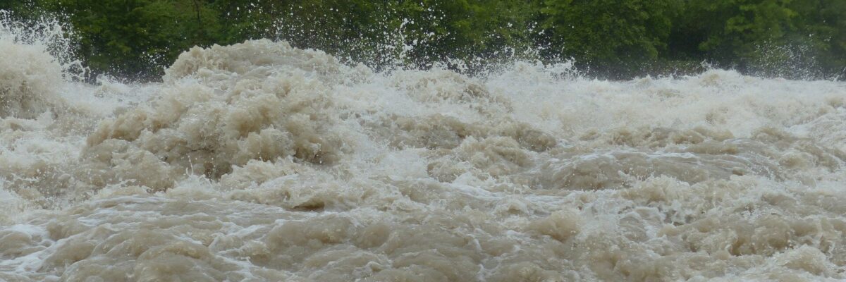 Residents continue search for 11-year-old boy swept away by flood waters