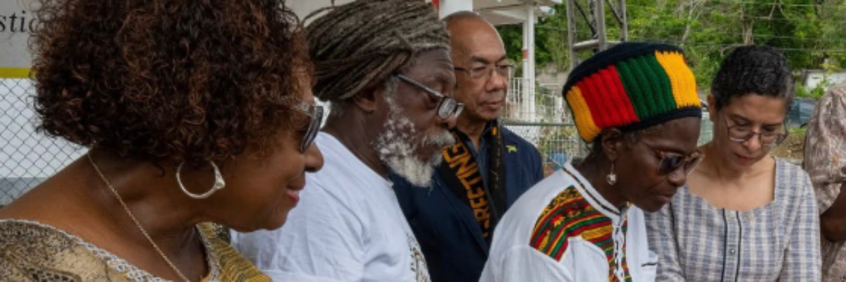 Land titles for Albion Heights handed over to the Rastafari Coral Gardens Benevolent Society
