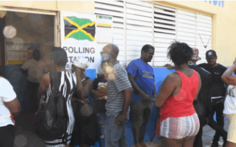 The island’s two main political parties raise concern over long voting lines and delays