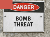 Bomb threats temporarily disrupted operations at Spanish Town Hospital and Police Station late last night