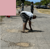 Greater Portmore residents patch potholes for National Labour Day